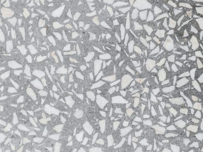 Detailed shot of a terrazzo floor showcasing intricate mosaic patterns.